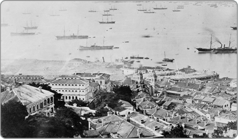 Central viewed from Caine Road, 1870s. The Victoria Prison and the former police headquarters are on the left.