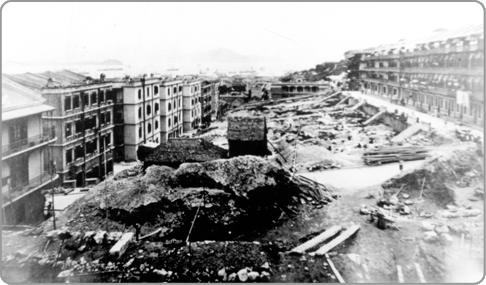 Areas on the Mid-Levels being cleared and rebuilt in 1898 as the deadly plague ravaged Hong Kong, to clean up the densely packed housing and unsanitary conditions contributive to the plague.