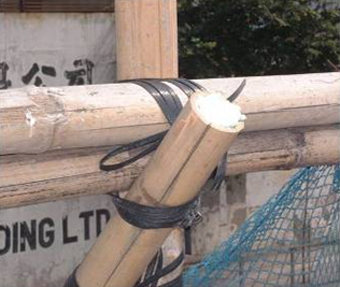 Bamboo poles are cut close to the node or their ends are wrapped up