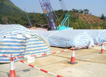 Materials are fully and smoothly covered with tarpaulin sheets