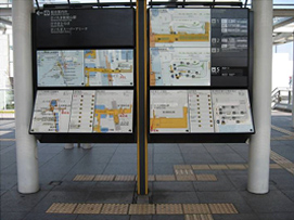 Interactive multi-media signboard that transmit information signals to portable terminals held by the user
