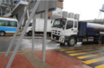 Street Washing on the Periphery of the Site